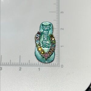 Vintage enamel MC marked Hawaii Charm.